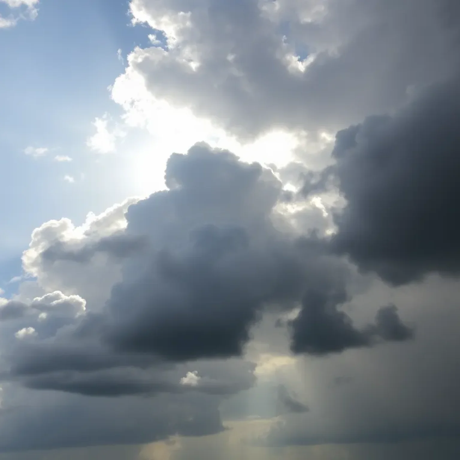 Storm clouds over Central Florida with signs of dry conditions