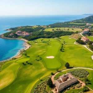 Lush greens of Costa Navarino Golf Resort with Mediterranean views